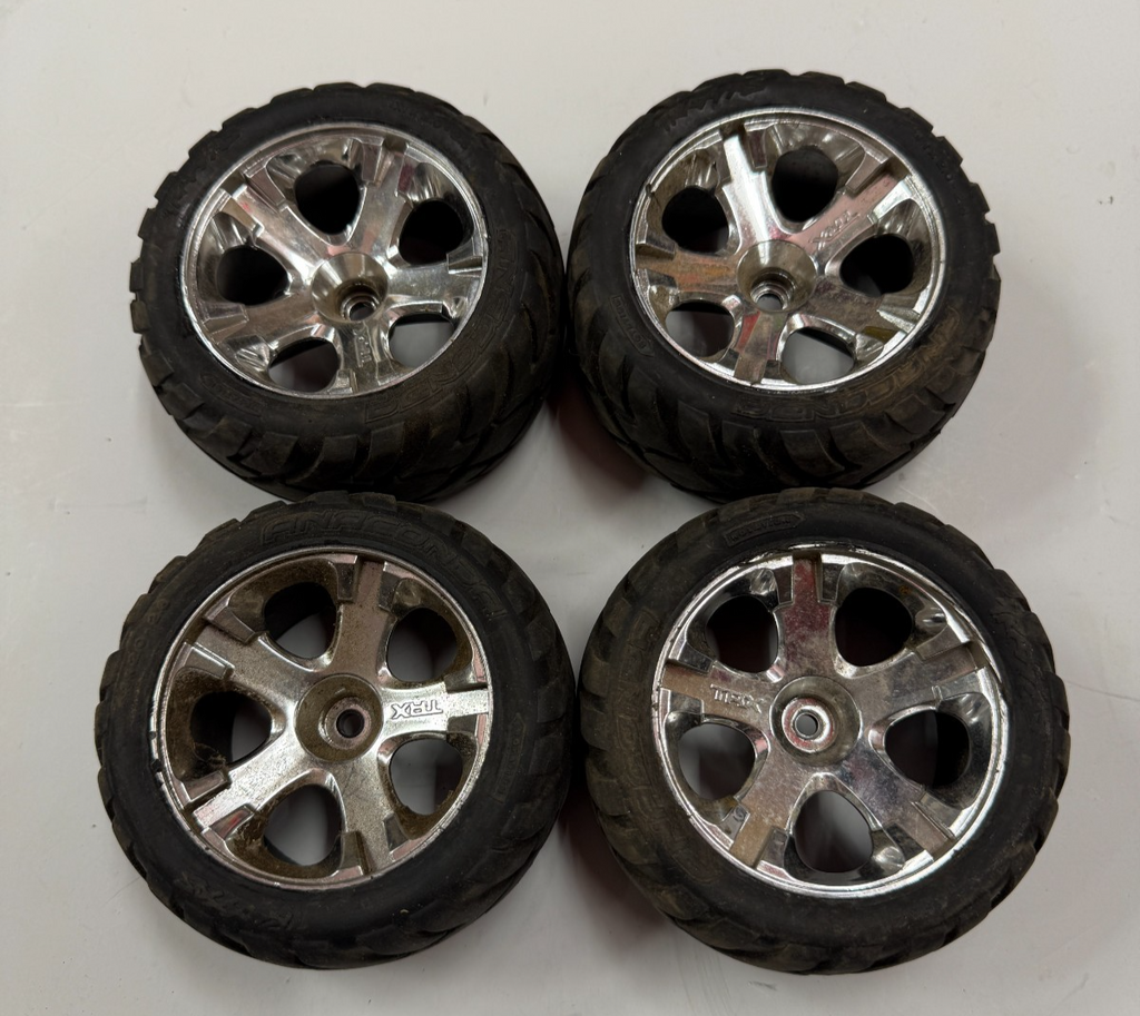 Nice Set of Four Traxxas Rustler / Stampede Anaconda Tires and Rims