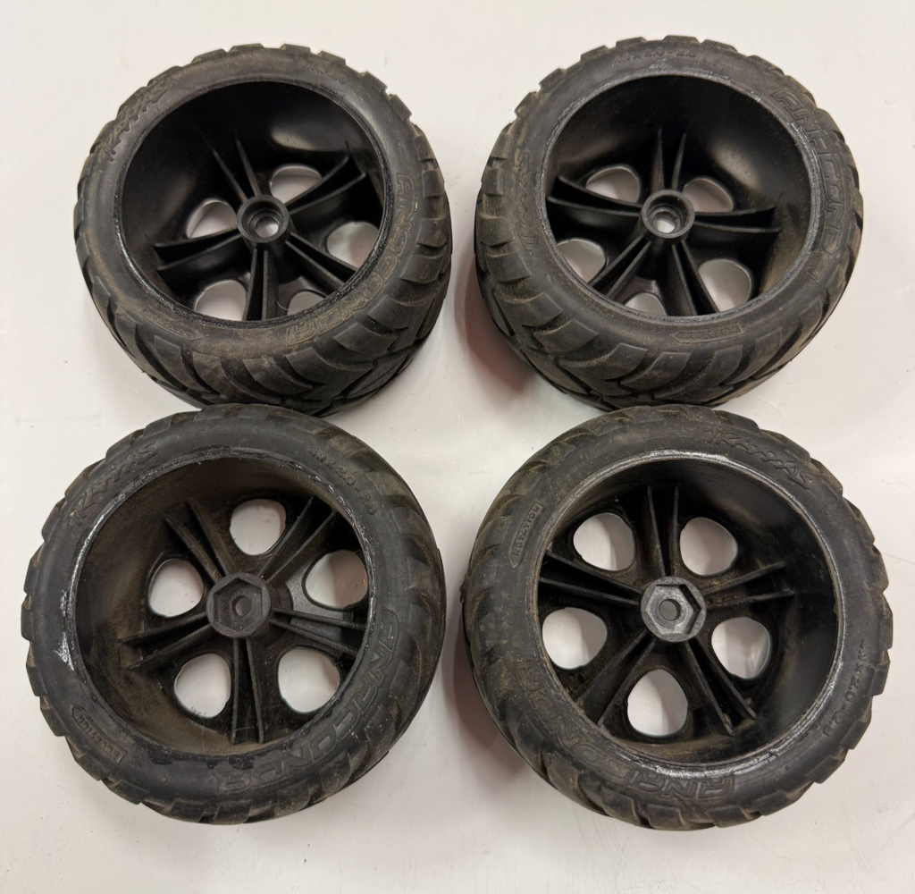 Nice Set of Four Traxxas Rustler / Stampede Anaconda Tires and Rims